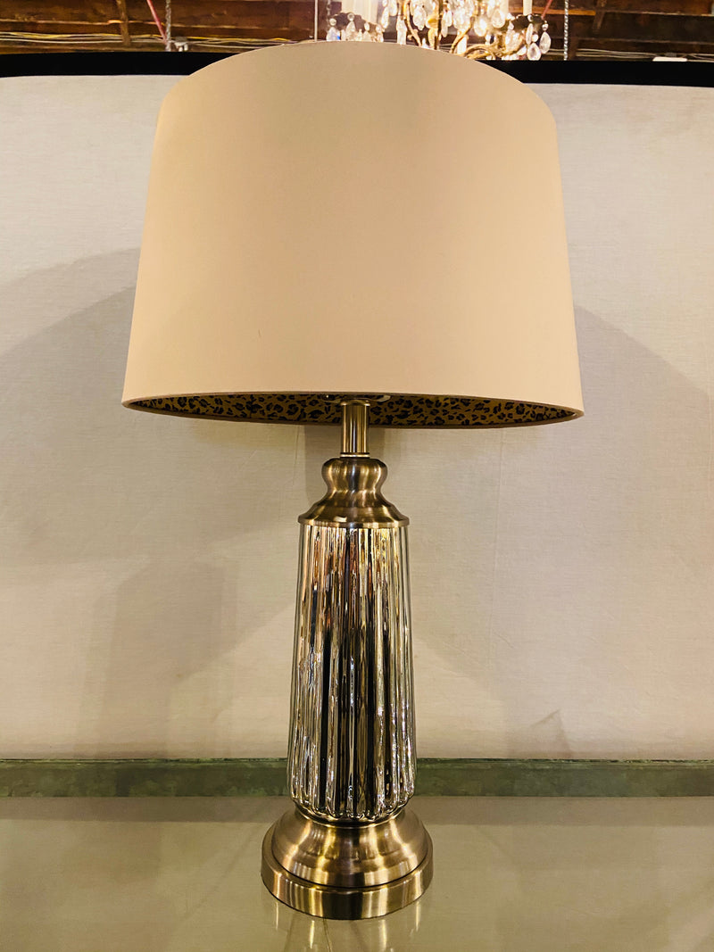 A Mercury Modern Lamp with Custom Shades