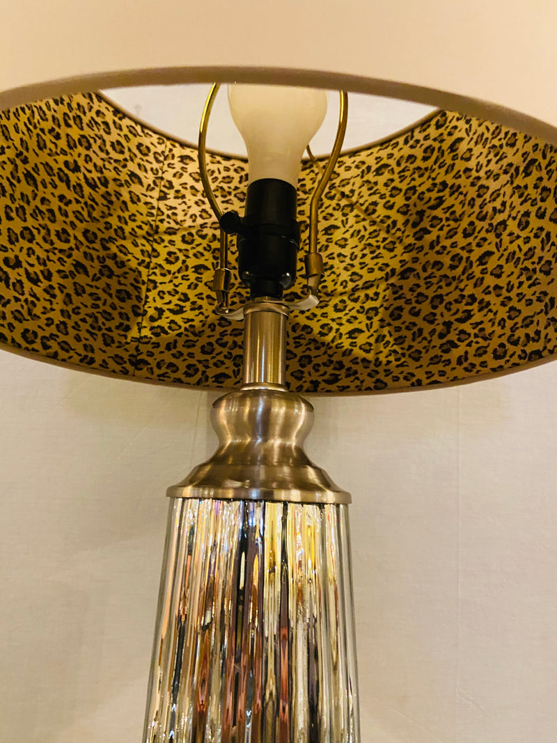 A Mercury Modern Lamp with Custom Shades