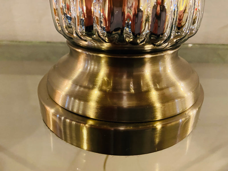 A Mercury Modern Lamp with Custom Shades