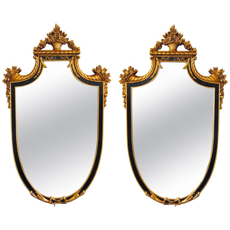 Pair of Hollywood Regency Style Ebony and Gilt Wood Wall or Console Mirrors