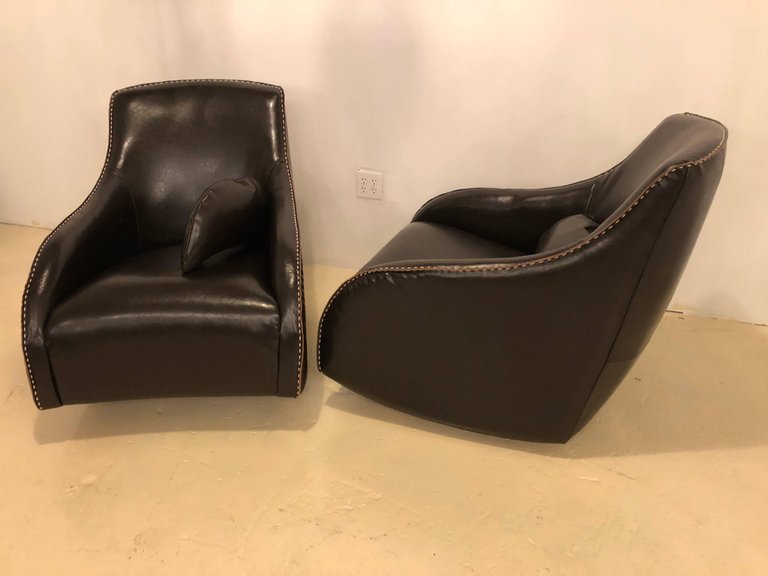 Pair of Fine Leather Rocking Chairs in the Mid-Century Modern Style