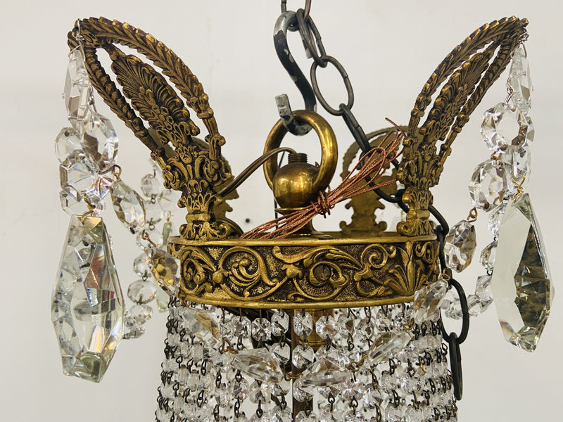 A French Louis XVI Empire Style Bronze and Crystal Chandelier